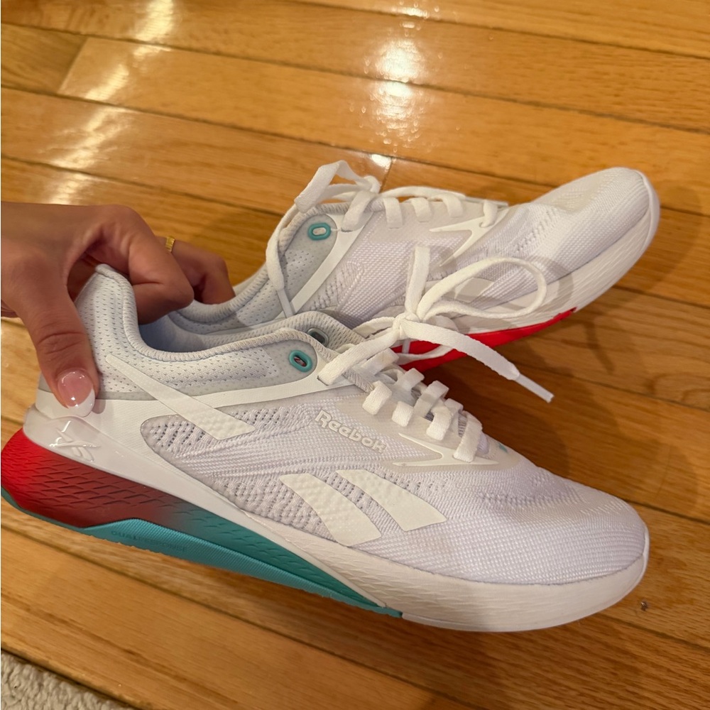 Reebok Women's White Running Shoes with Teal and Red Accents